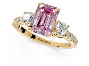 3 Stone Engagement Ring Setting for Fancy Pink Emerald Cut Center with Round Cut Side Accents and Prong Head in Yellow Gold