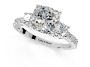3 Stone Engagement Ring Setting for Cushion Cut Center with Round Cut Side Accents and Prong Head in Platinum