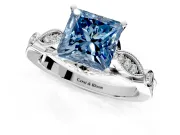 Solitaire Engagement Ring Setting for Fancy Blue Princess Cut Center with Marquise and Bezel Accents and Prong Head in Platinum