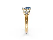 Cluster Engagement Ring Setting for Fancy Blue Oval Center with Round Cut Accent Frame and Prong Head in Yellow Gold