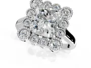 Cluster Halo Engagement Ring Setting for Radiant Cut Center with Milgrain Bezel Accents and Prong Head in Platinum