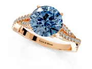 Solitaire Engagement Ring Setting for Fancy Blue Round Cut Center with Twisted Pave Split Shank and Prong Head in Rose Gold