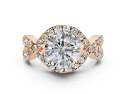 Halo Engagement Ring Setting for Round Cut Center with Pave Infinity Twist Band and Prong Head in Rose Gold