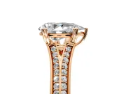 Solitaire Engagement Ring Setting for Pear-Shaped Center with Pave Rail Split Shank and Prong Head in Rose Gold