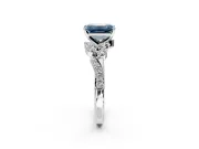 Solitaire Engagement Ring Setting for Fancy Blue Emerald Cut Center with Marquise Accent Twist Band and Prong Head in Platinum