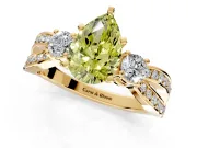 3 Stone Engagement Ring Setting for Fancy Yellow Pear-Shaped Center with Pave Twist Band and Prong Head in Yellow Gold