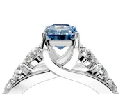 Solitaire Engagement Ring Setting for Fancy Blue Emerald Cut Center with Graduated Shared Prongs and Prong Head in White Gold