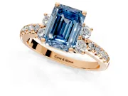 Paired Accent Engagement Ring Setting for Fancy Blue Emerald Cut Center with Pave Band and Prong Head in Rose Gold