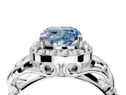 Halo Engagement Ring Setting for Fancy Blue Cushion Cut Center with Open Scroll Shoulders and Prong Head in Platinum