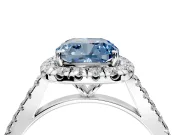 Halo Engagement Ring Setting for Fancy Blue Cushion Cut Center with Narrowing Pave Band and Prong Head in Platinum