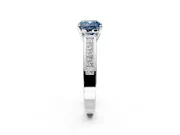 Solitaire Engagement Ring Setting for Fancy Blue Cushion Cut Center with Princess Cut Channel Band and Prong Head in White Gold