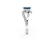Solitaire Engagement Ring Setting for Fancy Blue Emerald Cut Center with Pave Bypass Swirl Band and Prong Head in Platinum