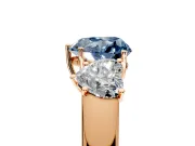 3 Stone Engagement Ring Setting for Fancy Blue Heart-Shaped Center with Raised Basket Heads and Prong Head in Rose Gold
