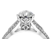 Solitaire Engagement Ring Setting for Pear-Shaped Center with Pave Rail Split Shank and Prong Head in Platinum