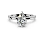 Solitaire Engagement Ring Setting for Pear-Shaped Center with Plain Band and Tulip Prong Head in Platinum