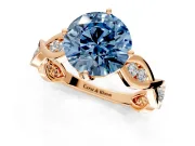 Solitaire Engagement Ring Setting for Fancy Blue Round Cut Center with Accented Twist Band and Leaf Prong Head in Rose Gold