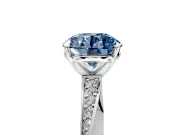 Side Accent Engagement Ring Setting for Fancy Blue Round Cut Center with Accent Shoulders and Prong Head in Platinum