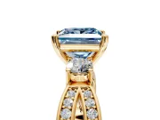 3 Stone Engagement Ring Setting for Fancy Blue Princess Cut Center with Pave Twist Band and Prong Head in Yellow Gold