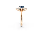Small-Accent Cluster Halo Engagement Ring Setting for Fancy Blue Round Cut Center with Plain Band and Prong Head in Rose Gold
