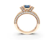 Pave Engagement Ring Setting for Fancy Blue Emerald Cut Center with Curved Accent Rows, Openwork and Prong Head in Rose Gold