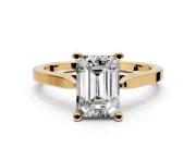 Solitaire Engagement Ring Setting for Emerald Cut Center with Tapered Shoulders and Prong Head in Yellow Gold
