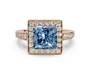 Bezel-Framed Halo Engagement Ring Setting for Fancy Blue Princess Cut Center with Pave Band and Prong Head in Rose Gold