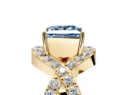 Halo Engagement Ring Setting for Fancy Blue Princess Cut Center with Pave Infinity Twist Band and Prong Head in Yellow Gold