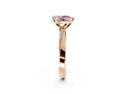 Side Accent Engagement Ring Setting for Fancy Pink Pear-Shaped Center with Accent Shoulders and Prong Head in Rose Gold