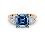 3 Stone Engagement Ring Setting for Fancy Blue Asscher Cut Center with Large Pear-Shaped Accents and Prong Head in Rose Gold