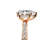 Solitaire Engagement Ring Setting for Pear-Shaped Center with Fine Pave Band and Prong Head in Rose Gold