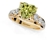Solitaire Engagement Ring Setting for Fancy Yellow Heart-Shaped Center with Graduated Shared Prongs and Prong Head in Yellow Gold