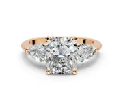 3 Stone Engagement Ring Setting for Radiant Cut Center with Large Pear-Shaped Accents and Prong Head in Rose Gold