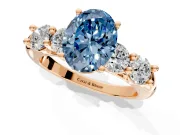5 Stone Engagement Ring Setting for Fancy Blue Oval Center with Graduated Accents and Prong Head in Rose Gold