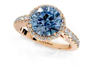 Halo Engagement Ring Setting for Fancy Blue Round Cut Center with Full Pave Band and Prong Head in Rose Gold