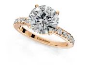 Solitaire Engagement Ring Setting for Round Cut Center with Round Cut Pave Band and Prong Head in Rose Gold