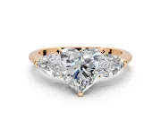 3 Stone Engagement Ring Setting for Heart-Shaped Center with Large Pear-Shaped Accents and Prong Head in Rose Gold