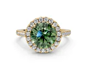 Halo Engagement Ring Setting for Fancy Green Round Cut Center with Narrowing Pave Band and Prong Head in Yellow Gold