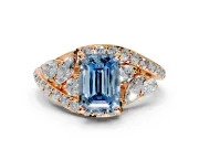 Halo Engagement Ring Setting for Fancy Blue Emerald Cut Center with Marquise and Pave Bypass Band and Prong Head in Rose Gold