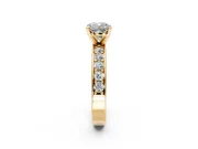 Solitaire Engagement Ring Setting for Cushion Cut Center with Channel-Set Accents and Prong Head in Yellow Gold
