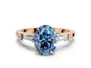 Bar-Set Engagement Ring Setting for Fancy Blue Oval Center with Tapered Baguette Accents and Prong Head in Rose Gold