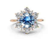 Small-Accent Cluster Halo Engagement Ring Setting for Fancy Blue Round Cut Center with Plain Band and Prong Head in Rose Gold