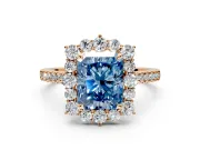 Halo Engagement Ring Setting for Fancy Blue Radiant Cut Center with Single-Row Pave, Open Basket and Prong Head in Rose Gold