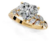 Solitaire Engagement Ring Setting for Heart-Shaped Center with Marquise Accent Twist Band and Prong Head in Yellow Gold
