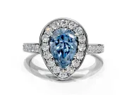 Bezel-Framed Halo Engagement Ring Setting for Fancy Blue Pear-Shaped Center with Pave Band and Prong Head in Platinum