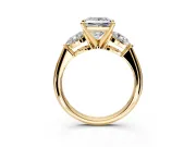 3 Stone Engagement Ring Setting for Princess Cut Center with Large Pear-Shaped Accents and Prong Head in Yellow Gold