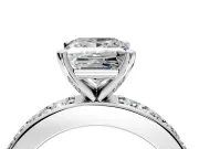 Solitaire Engagement Ring Setting for Princess Cut Center with Channel-Set Accents and Prong Head in Platinum