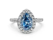 Halo Engagement Ring Setting for Fancy Blue Pear-Shaped Center with Narrowing Pave Band and Prong Head in White Gold