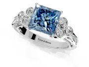 Cluster Engagement Ring Setting for Fancy Blue Princess Cut Center with Bezel Accent Clusters and Prong Head in Platinum