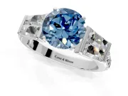 Channel-Set Engagement Ring Setting for Fancy Blue Round Cut Center with Baguette Band and Prong Head in Platinum