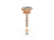 Halo Engagement Ring Setting for Fancy Blue Pear-Shaped Center with Openwork Halo, Pave Band and Prong Head in Rose Gold